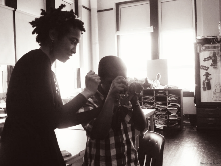 Nastassia Davis teaching the students at New Jersey Ave School in Atlantic City about photography and "focus". Career Day. 5/25/12
