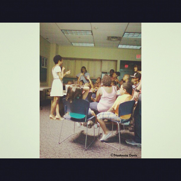 Nastassia Davis speaking to students during Photography Workshop in Pleasantville, NJ. 